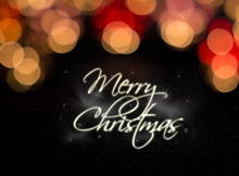 Merry Christmas White Lettering Over Back Background And Bokeh