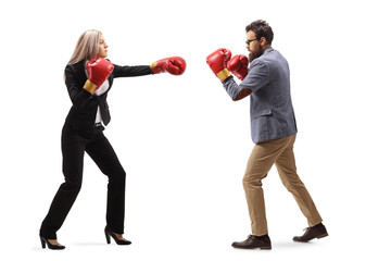 Poster - Businesswoman punching a man with boxing gloves