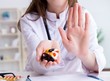 © Elnur - Doctor with pills working in hospital