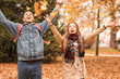 © Pixel-Shot - Happy couple having fun in autumn park