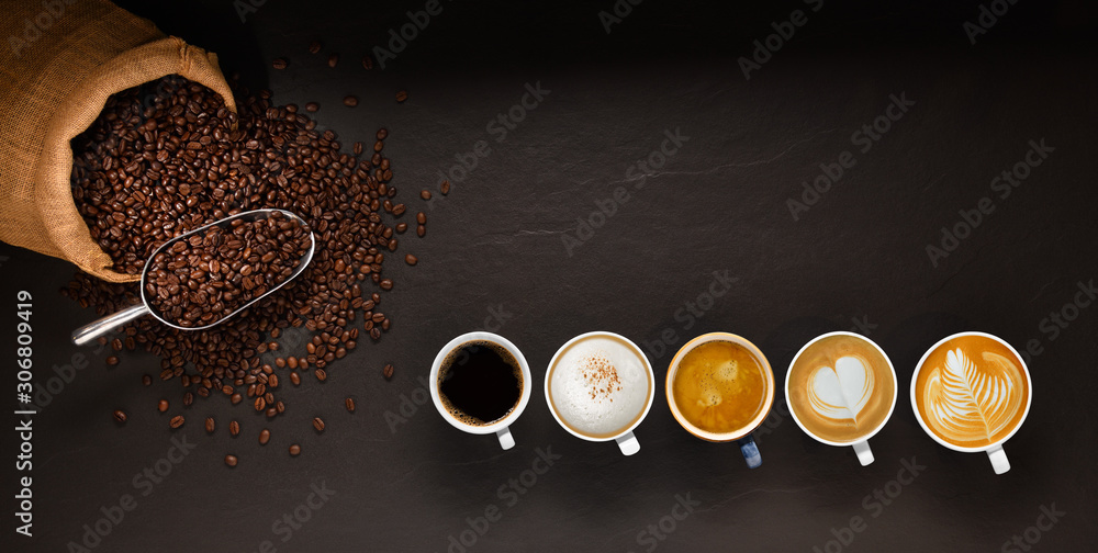Variety of cups of coffee and coffee beans in burlap sack on black background. - obrazy, fototapety, plakaty 