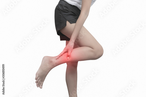 Cuadros en Lienzo Woman with calf feeling pain on white background