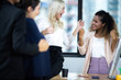 © chokniti - The young business team is happening the success of the business  business success concept