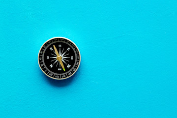 Wall Mural - Compass - small and stylish - on blue background top view copy space
