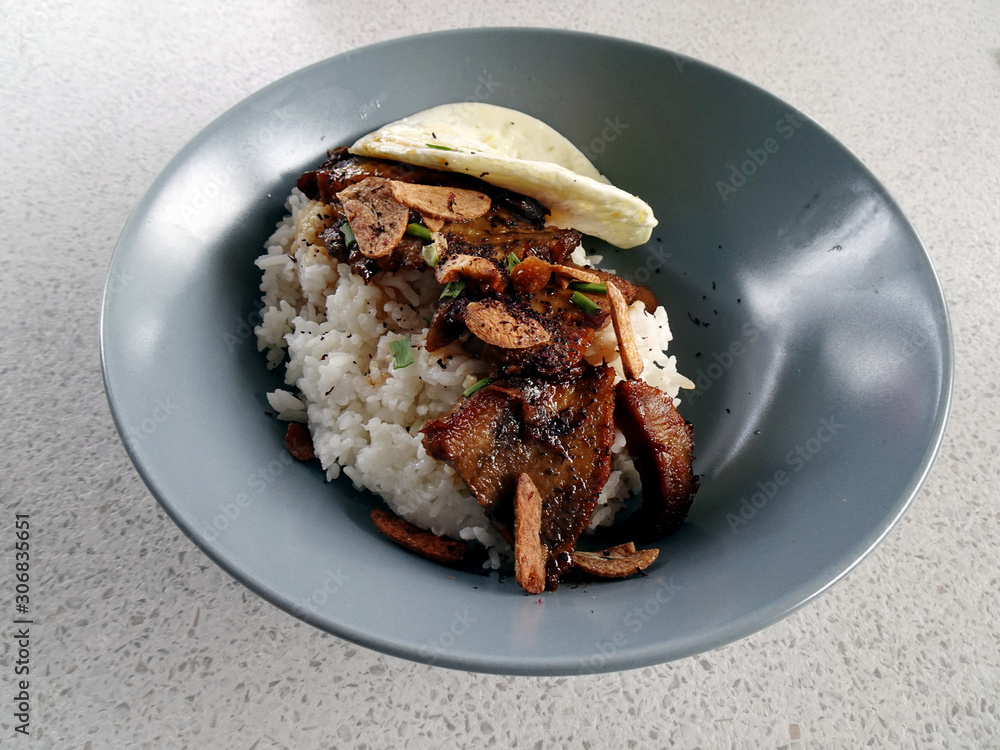 Beef tongue or Gyutan Truffle Don with white rice and sunny side up in ...