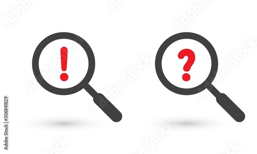Fotografía Magnifier glass with exclamation sign and question mark