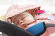 © satura_ - Childhood and safety concept - Infant baby girl sleeping in child car seat
