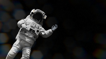Canvas Print - astronaut waving during space walk