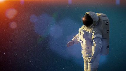 Wall Mural - standing astronaut in front of the milky way galaxy