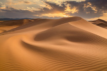 Sunset Over The Sand Dunes In The Desert