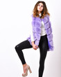 © be free - Luxury fur clothes for female. Fashion trend concept. Winter fashionable wardrobe for female. Boutique selling fur. Violet fur vest fashion clothing. Woman makeup face wear fur vest white background