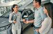 © Valerii Apetroaiei - At a car dealership, buying a car
