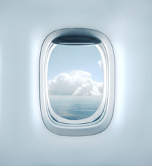 Aairplane window with clouds view