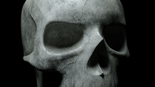 Human Skull On An Isolated Black Background. Texture Cracked Skeleton Bone Close Up. The Light Turns On And Off. 3d Illustration