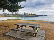 Bench In The Park With Sea View And Island