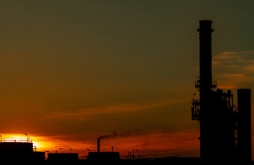 Wall Mural - Gas turbine electrical power plant. Energy for support factory in industrial estate. Natural gas tank. Small gas power plant. Power plant using natural gas for fuel. Green energy. Dramatic sunset sky.