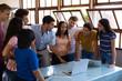 © Wavebreak Media - Teenagers and teacher in classroom