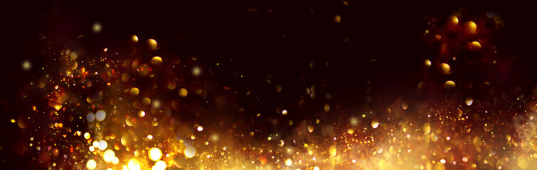 Wall Mural - golden christmas and new year glittering stars swirl on black bokeh background, backdrop with sparkl