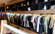 Men Clothing Shop,  Casual Clothes On Hangers And Shelves In Apparel Store