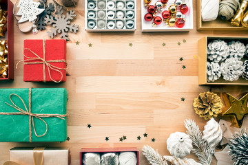 Wall Mural - merry christmas concepts with gift box present and ornament element on wood table background