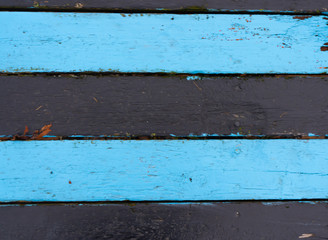 Black blue wooden background. Painted, peeled wood texture. Background photo with space for text.