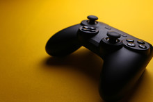 Game Joystick On A Yellow Background