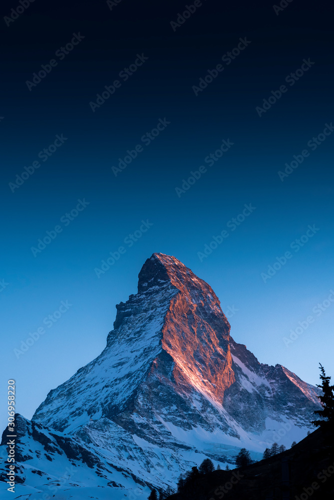 The famous mountain Matterhorn peak with cloudy and blue sky from Gornergrat, Zermatt, Switzerland - obrazy, fototapety, plakaty 