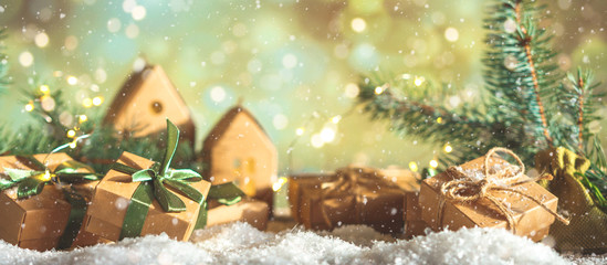 christmas and zero waste, eco friendly packaging gifts in kraft paper on a wooden table, eco christm