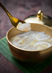 Wall Mural - Sweet Sago Cream with coconut milk on wood,Thai dessert