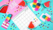 On-trend 2020 Calendar Page For The Month Of June Modern Flat Lay With Seasonal Food, Candy And Colorful Decorations In Popular Pastel Colors. One Of A Series For 12 Months Of The Year.