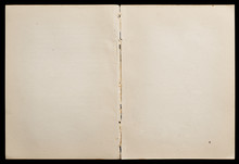 Antique Book Unfolded Showing Textured Pages Isolated On Black Background.