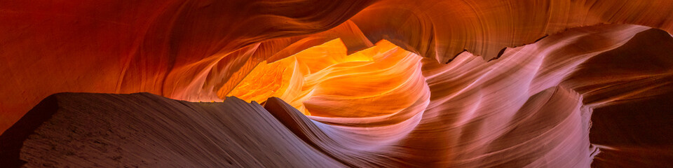 Panoramic glowing rocks in colorful Antelope Canyon near Page, Arizona. Travel concept.