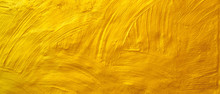 Roughly Plastered Wall Texture Background Painted With Gold Paint