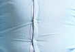 Overweight man in tight clothes, closeup. Weight loss concept
