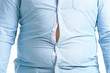 © Pixel-Shot - Overweight man in tight clothes, closeup. Weight loss concept
