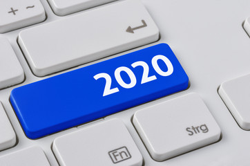 Wall Mural - a keyboard with a blue button - 2020