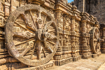 Wall Mural - Veew at the decorative stone relief wheels of Konark Sun Temple in India, Odisha