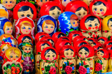 Wall Mural - Traditional souvenirs from Russia - colorful nesting dolls, also known as matryoshka, babushka, stacking dolls, or Russian dolls