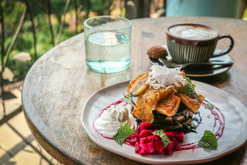 Wall Mural - Stack of vegan pancakes, coffee and glass of water