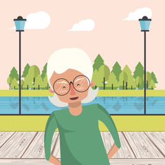 Canvas Print - cute grandmother in the park landscape