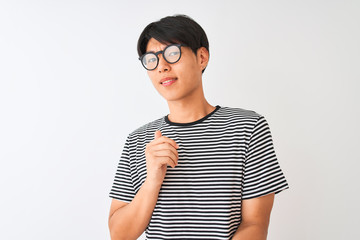 Sticker - Chinese man wearing glasses and navy striped t-shirt standing over isolated white background disgusted expression, displeased and fearful doing disgust face because aversion reaction.