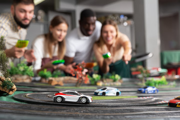 Models of race cars on track