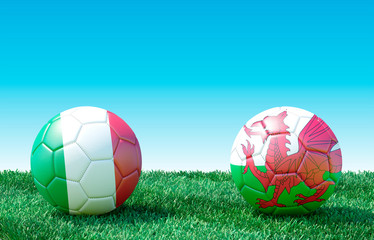 Two soccer balls in flags colors on green grass. Italy and Wales. 3d image