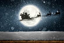 Silhouette Of A Flying Goth Santa Claus Against The Background Of The Night Sky. Elements Of This Image Furnished By NASA