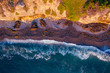 Ocean Waves Crashing on a California beach overhead aerial image