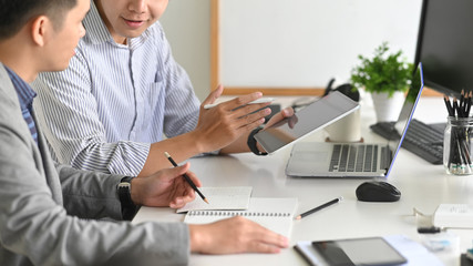 UX UI design concept, developer working with tablet.