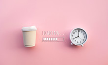 Drinking,refreshment In Morning Concepts With Coffee Cup And Clock(watch) With Loading Text On Color Background