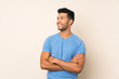 © luismolinero - Young handsome man over isolated background happy and smiling