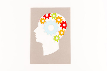 Sticker - top view of human head silhouette with gears isolated on white