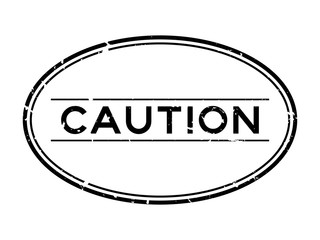 Poster - Grunge black caution word oval rubber seal stamp on white background